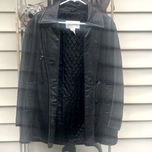 Thick, warm, soft, loose fitting. A very nice jacket, just too big for me.